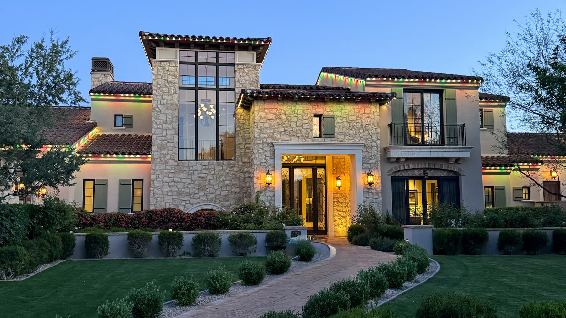 A well-presented home exterior with lighting and a tidy entrance, used for pre-sale value improvement advice.